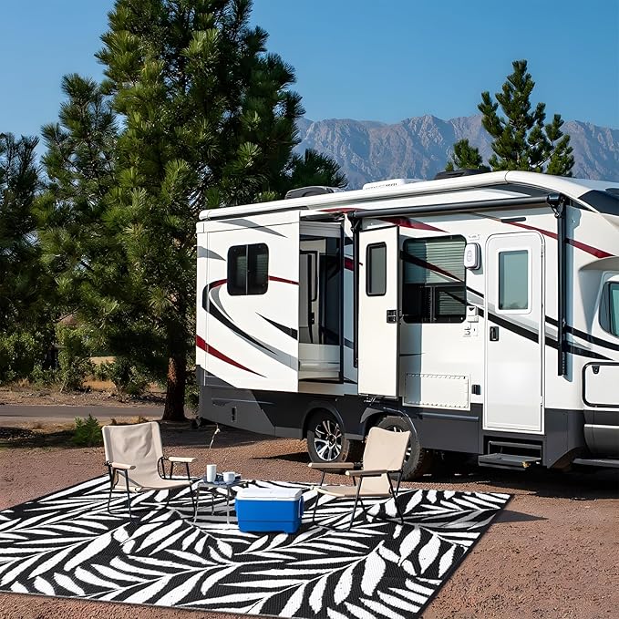 OLANLY Waterproof Outdoor Rug 6x9 ft, Reversible Outdoor Plastic Straw Rug with Leaf Pattern, RV Mat, Indoor Outdoor Carpet for Patio, Camping, Balcony, Deck, Backyard, Black & White