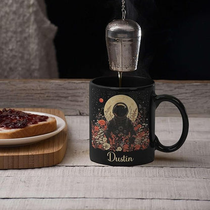 Astronaut with Moon and Wildflowers Coffee Mug, Custom Name Ceramic Cup 11oz 15oz, Unique Astronaut Coffee Cup for Friends, Personalized Astronomy Black Mug, Gifts for Birthday