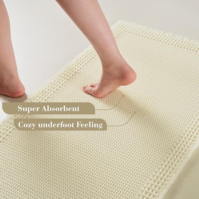 RESARE Waffle Bath Mat for Bathroom, Super Absorbent Bathroom Rugs Non Slip Machine Washable, Ultra Soft Quick Dry Boho Bath Rugs with Tassels for Floor, Upgraded Bordered Design, 17"x24" Cream