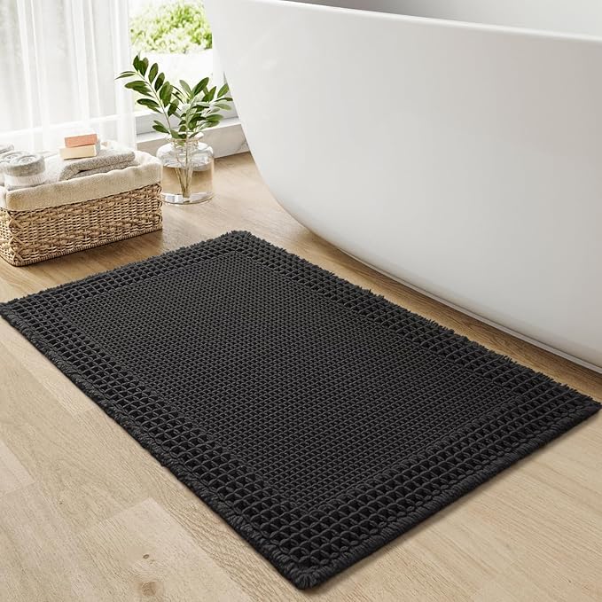 RESARE Waffle Bath Mat for Bathroom, Super Absorbent Bathroom Rugs Non Slip Machine Washable, Ultra Soft Quick Dry Boho Bath Rugs with Tassels for Floor, Upgraded Bordered Design, 24"x36" Black