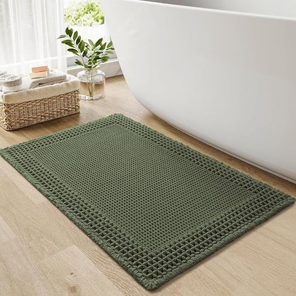 RESARE Waffle Bath Mat for Bathroom, Super Absorbent Bathroom Rugs Non Slip Machine Washable, Ultra Soft Quick Dry Boho Bath Rugs with Tassels for Floor, Upgraded Bordered Design, 18"x30" Green