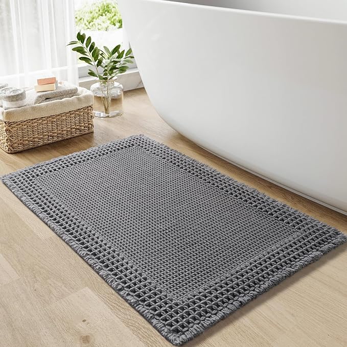 RESARE Waffle Bath Mat for Bathroom, Super Absorbent Bathroom Rugs Non Slip Machine Washable, Ultra Soft Quick Dry Boho Bath Rugs with Tassels for Floor, Upgraded Bordered Design, 24"x36" Dark Grey